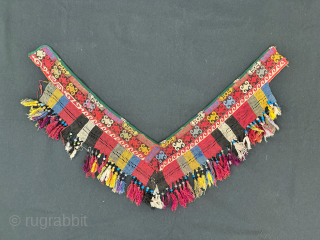 An exceptional antique Uzbek Lakai Tribe silk cross stitched embroidered 'saygosha' hanging, dating to late 19th century. These 'v' shaped hangings were dowry textiles, initially made to attach to the elegant and  ...