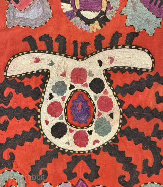 A lovely Antique Uzbek Lakai Uut kap Ilgich embroidered Suzani. This shield shaped embroidery dates to late 19th century / early 1900’s and is a nice large scale example. The embroidery ...