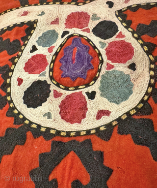 A lovely Antique Uzbek Lakai Uut kap Ilgich embroidered Suzani. This shield shaped embroidery dates to late 19th century / early 1900’s and is a nice large scale example. The embroidery ...