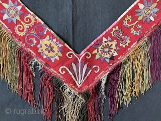 An exceptional antique Uzbek Lakai Tribe silk embroidered 'saygosha' hanging, dating to 19th century. These 'v' shaped hangings were dowry textiles, initially made to attach to the elegant and decorative bridal bed  ...