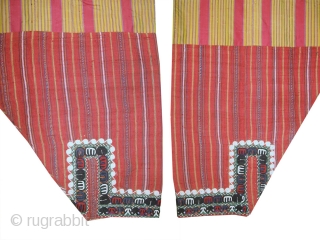 An antique Turkoman / Turkmen silk embroidered silk ikat trousers attributed to the Yomud / Yomut tribe. This beautiful ethnographic bridal textile art dates to the late 19th century and would have  ...