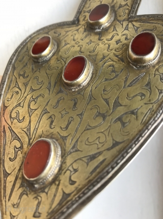 An Excellent  Antique Turkoman / Turkmen silver pendant with gold painted and fired and carnelian inset. These heart shaped pendants (worn in a necklace ) are known as 'Asyk' and this  ...
