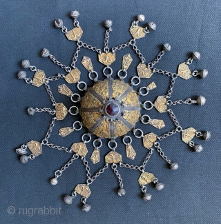 An extraordinary silver with gold appliqué with carnelian inset antique Turkoman / Turkmen Jewellery attributed to the Yomud / Yomud confederation tribes. Dating to the 19th century, this is a coveted example  ...