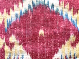 An exceptional Antique early to mid 19th century Uzbek Adras Ikat quilted hanging from Bokhara / Bukhara region. It is a haft rang / seven colour Ikat which is considered the highest  ...