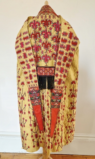 An outstanding antique Tekke Turkoman / Turkmen silk embroidered on silk yellow Chyrpy ( Cherpi / Chirpi / Chyrpi ), dating to mid 19th Century or even older. The Chyrpy was the  ...