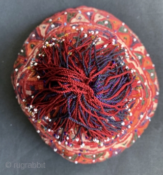 An excellent and very unusual silk embroidered antique hat made by the Turkoman / Turkmen Ersari tribe. This rare piece dates to the late 19th century and is fully silk embroidered. The  ...