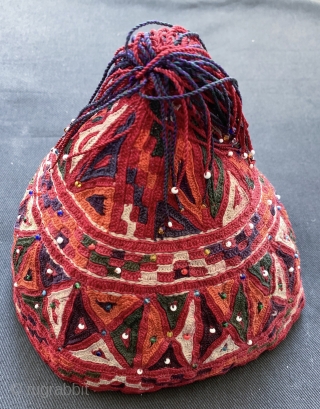 An excellent and very unusual silk embroidered antique hat made by the Turkoman / Turkmen Ersari tribe. This rare piece dates to the late 19th century and is fully silk embroidered. The  ...