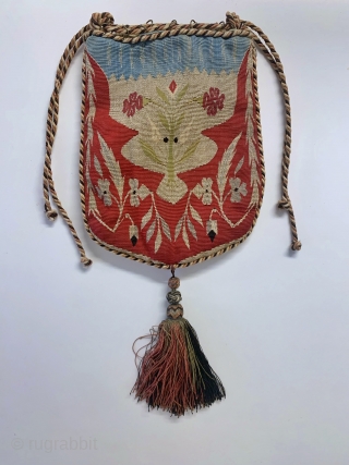 A magnificent antique Syrian Aleppo silk and gold/silver metallic tapestry weave bag from late 19th century - early 1900’s. An extremely rare and fine textile boasting an elegant floral design surrounded by  ...