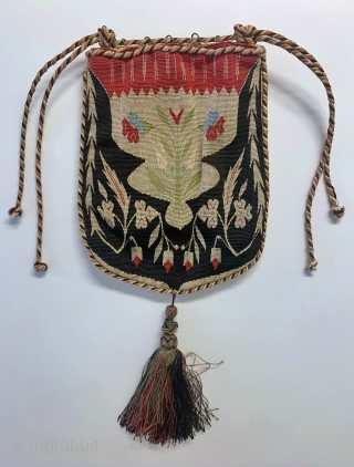 A magnificent antique Syrian Aleppo silk and gold/silver metallic tapestry weave bag from late 19th century - early 1900’s. An extremely rare and fine textile boasting an elegant floral design surrounded by  ...