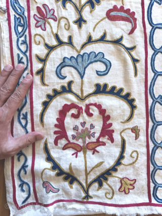 An outstanding antique Uzbek Shahrisabz silk Suzani, showcasing exceptionally fine silk chain-stitched embroidery on an unusual silk blend (?) textured and patterned white ground fabric. Dating close to mid 19th century, it  ...