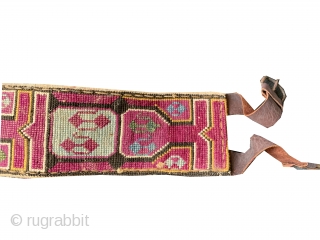 A beautiful antique silk cross-stitched belt made by the Uzbek Lakai tribe of Central Asia. This fine and functional belt, dates around early 1900's and was worn likely by a man over  ...