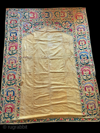 An Exceptional Antique Uzbek Suzani from Shahrisabz with near perfect silk chain stitched embroidery on a yellow Adras (silk warp / cotton weft) ground. These suzanis are sometimes wrongly attributed in trade  ...