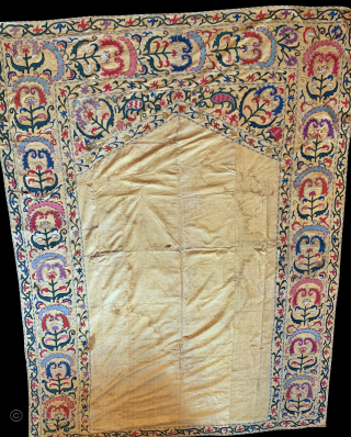 An Exceptional Antique Uzbek Suzani from Shahrisabz with near perfect silk chain stitched embroidery on a yellow Adras (silk warp / cotton weft) ground. These suzanis are sometimes wrongly attributed in trade  ...