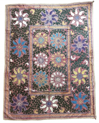 A beautiful and very decorative antique Uzbek Shahrisabz silk embroidered suzani. It dates to the late 19th century - early 1900s and it is a very unusual example. The fine polychrome silk  ...