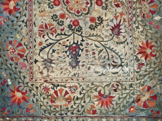 An Outstanding antique Uzbek Shahrisabz silk embroidered suzani from approx.mid 19th century. It has exceptionally fine silk chain stitched embroidery. The floral design is visually dazzling, with a central medallion surrounded by  ...