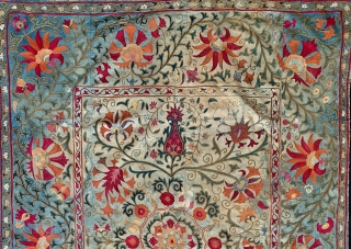 An Outstanding antique Uzbek Shahrisabz silk embroidered suzani from approx.mid 19th century. It has exceptionally fine silk chain stitched embroidery. The floral design is visually dazzling, with a central medallion surrounded by  ...