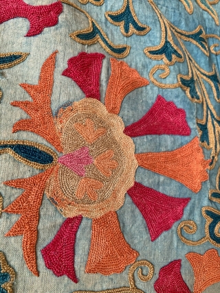 An Outstanding antique Uzbek Shahrisabz silk embroidered suzani from approx.mid 19th century. It has exceptionally fine silk chain stitched embroidery. The floral design is visually dazzling, with a central medallion surrounded by  ...