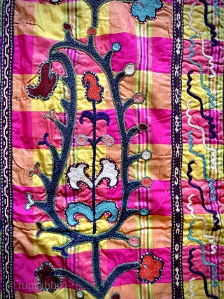 A visually dazzling antique Uzbek silk on silk nim suzani from Shahrisabz region dating to early 1900’s. It is fine silk chain stitched on a chequered silk ground. I’m not sure but  ...