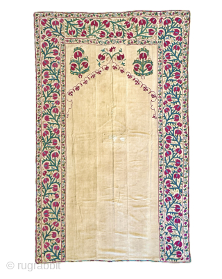 An excellent and very elegant antique 19th century Uzbek Bukhara Suzani, showcasing exceptionally fine silk embroidery on a cotton Karbos ground. Dating around 1860’s, it has exceptionally fine silk chain-stitched embroidery, near  ...