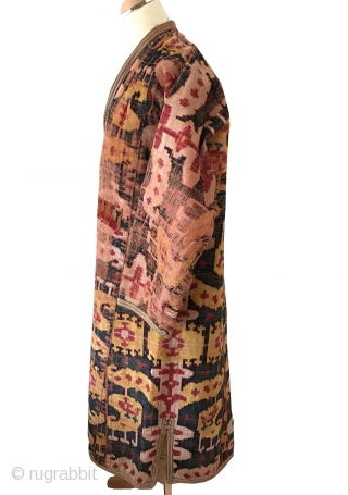 An excellent antique Uzbek silk velvet Ikat Chapan / Robe dating to the 3rd quarter of the 19th Century. While Ikat textiles of Central Asia were some of the most sophisticated woven  ...