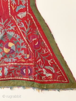 A lovely antique Uzbek Lakai silk embroidered horse blanket / saddle cover. This lovely ethnographic embroidery dates to the late 19th century and is polychrome silk chain stitched embroidery on red wool  ...