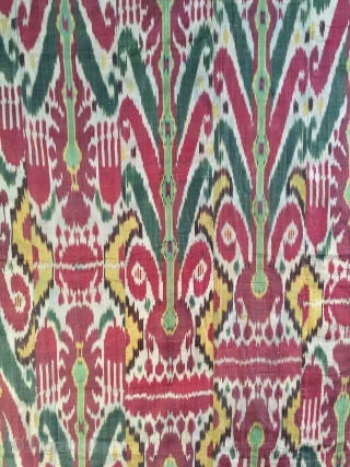 a Large antique Uzbek silk Adras Ikat dating to the 19th century Bulhara or khorezm. The magnificent wall Hanging is an older silk warp cotton weft Ikat. The archaic design of repeating  ...