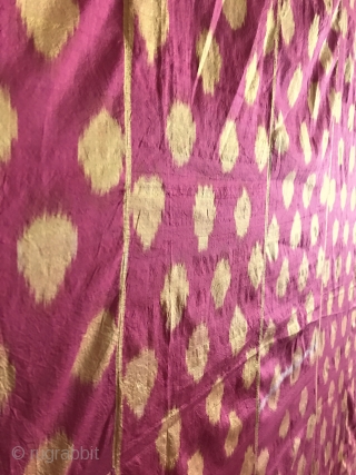 A visually dazzling antique Uzbek silk on silk Ikat hanging from Bukhara dating to third quarter of the 19th century. It is silk warp and silk weft Abr Ikat with a lovely  ...