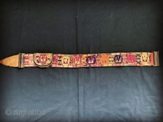 An excellent antique Central Asian silk embroidered belt with original leather backing, pocket and gilded insert buckle. It dates to late 19th century and it is an excellent example work by a  ...