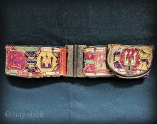 An excellent antique Central Asian silk embroidered belt with original leather backing, pocket and gilded insert buckle. It dates to late 19th century and it is an excellent example work by a  ...