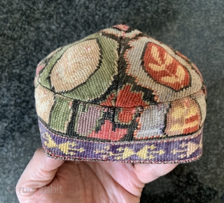 A beautiful antique Uzbek silk Iroqi stitched embroidered hat from Shahrisabz region. Dating to the late 19th century this rare hat is made of a form of cross stitched associated with the  ...