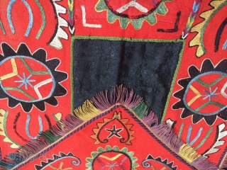 An fine antique Uzbek Lakai silk embroidered ayna khalta /  ilgich, dating to late 19th century. This envelope shaped talismanic hanging with a false flap represents the wedding ceremonial mirror bags.  ...