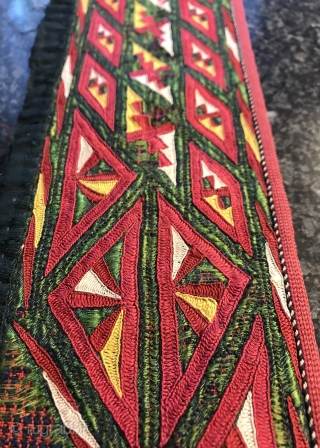 An exceptional antique Tekke Turkoman / Turkmen chyrpy or coat silk embroidered collar. It dates to the 19th century and it is an exceptional demonstration of the coveted Tekke tribe's embroidery art.  ...
