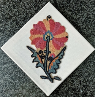 An exceptional antique Uzbek Nurata silk suzani fragment (mounted on a canvas) dating to the mid 19th century The fine silk embroidery is intricately flat-stitched. The colours and the natural dyes are  ...