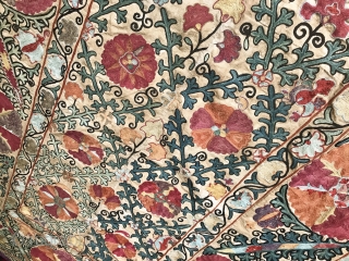 An beautiful Antique Uzbek Bokhara Suzani / Susani dating to the 19th Century. It is fine silk embroidery on Karbos (hand woven cotton) fabric using a chain stitched technique. The lattice floral  ...
