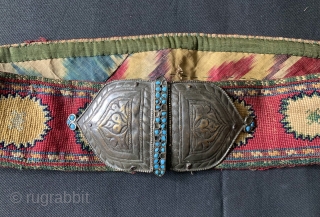 An elegant and fine antique Uzbek shahrisabz silk cross-stitched (iroqi stitched) belt with silver buckle and turquoise inlay. It dates to the 3rd quarter of the 19th century and it is an  ...