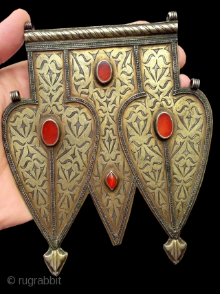 An Exceptional Antique Turkoman / Turkmen silver Double Asyk pendant with gold painted and fired and carnelian inset. This outstanding example wa made by the Tekke / Teke tribe and dates mid  ...