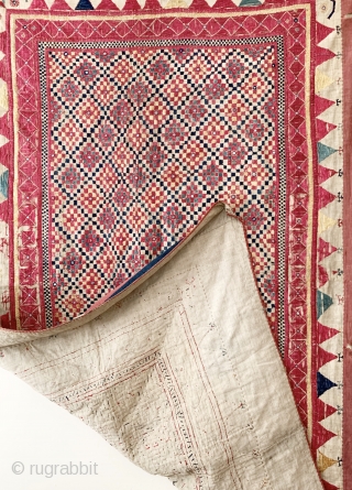 A gorgeous antique Indian silk embroidered and appliquéd wall or tent hanging from Gujarat. It dates around early 1900s and it is a visual delight. The field is made of floss silk  ...