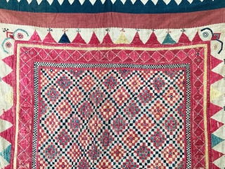 A gorgeous antique Indian silk embroidered and appliquéd wall or tent hanging from Gujarat. It dates around early 1900s and it is a visual delight. The field is made of floss silk  ...