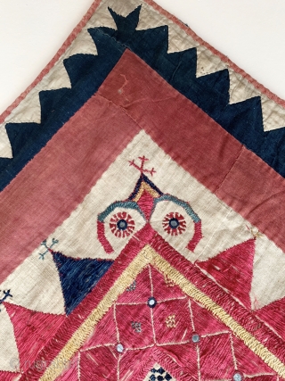 A gorgeous antique Indian silk embroidered and appliquéd wall or tent hanging from Gujarat. It dates around early 1900s and it is a visual delight. The field is made of floss silk  ...