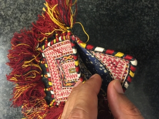 An exceptional antique Tekke Turkoman silk purse / bag. This a very rare type with gorgeous colours and lovely tassels. A rare gem reflecting the rich textile tradition of tekke Turkmen tribe.  ...