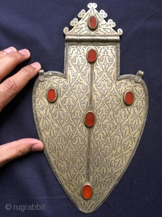 A majestic large Antique Turkoman / Turkmen gilded silver Asyk pendant and carnelian inset. This museum grade example was made by the Tekke / Teke tribe and dates mid to third quarter  ...