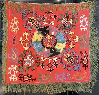 An Exceptional antique Uzbek Lakai Tribe silk embroidered Ilgich / Ayna Khalta hanging dating to the last quarter of 19th century. This particular example is very unique. The medallion with four boteh  ...