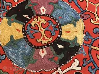 An Exceptional antique Uzbek Lakai Tribe silk embroidered Ilgich / Ayna Khalta hanging dating to the last quarter of 19th century. This particular example is very unique. The medallion with four boteh  ...