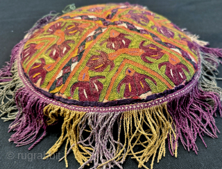 A rare and visually dazzling Antique Turkoman / Turkmen Ersari tribe silk embroidered pillow dating to late 19th century. It is a fully silk embroidered, very likely a dowry piece. The design ...