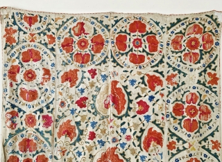 A beautiful antique Uzbek silk suzani from 19th century Bukhara. Boasting a rich floral field design with an array of palmettes, interspersed with vines and smaller floral repertoires. The borders have large  ...