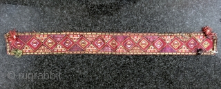 An exceptional antique Uzbek Lakai silk cross-stitched belt. It dates to the late 19th century and it is a beautiful piece. The geometric design is beautiful with gorgeous colours. It has the  ...