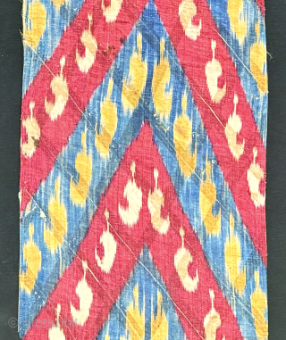 A magnificent antique silk warp / cotton weft Adras early Ikat fragment hanging from Bukhara. While it looks like a piece of modern art, it actually dates around mid 19th century. A  ...