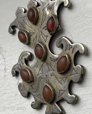 A very fine example of Antique Tekke Turkoman / Turkmen gold painted silver pendant with carnelian insets. Dating to the 19th century these intricately shaped bridal jewellery are known as Gulbaqa (literally  ...