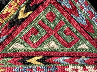 A brilliant Antique Ersari Turkoman / Turkmen Talismanic silk embroidery tawees / moska, dating to 19th century. Such fine triangular silk embroideries were known as moskas or tawees and to made to  ...