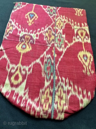 An excellent Antique 19th century Uzbek Adras quilted Ikat shield shaped hanging from Bokhara / Bukhara region. It is an early Ikat woven with silk warp and cotton weft adras. The gorgeous  ...